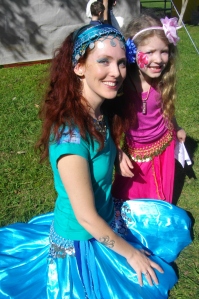 Belly dancing mother and child
