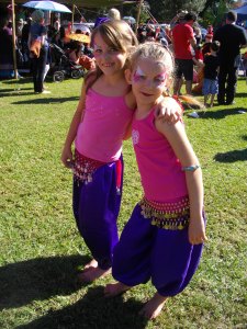 face painted belly dancing kids